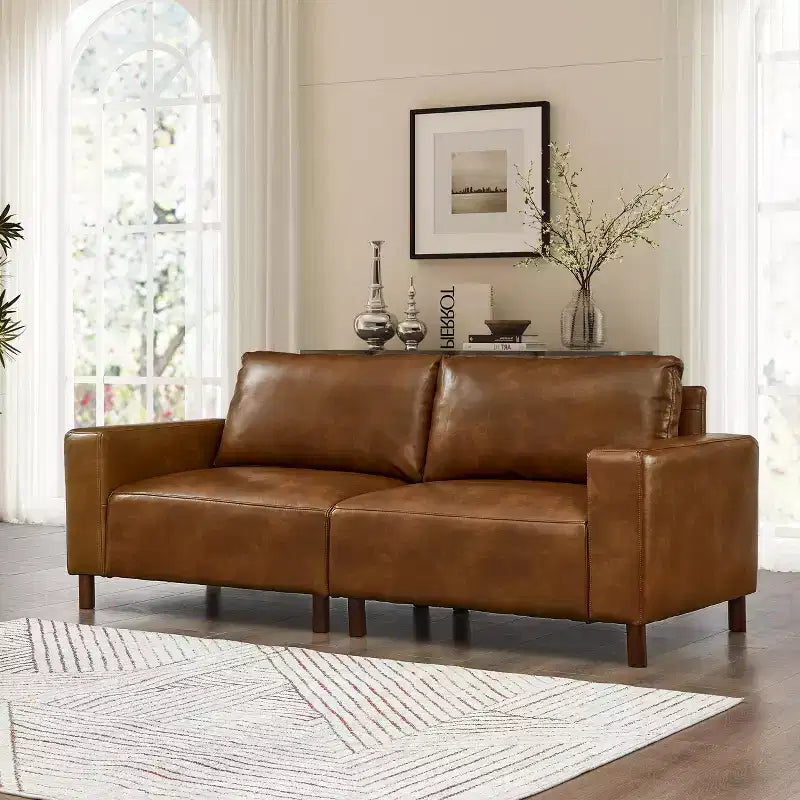 Causeuse de style moderne du milieu du siècle en similicuir