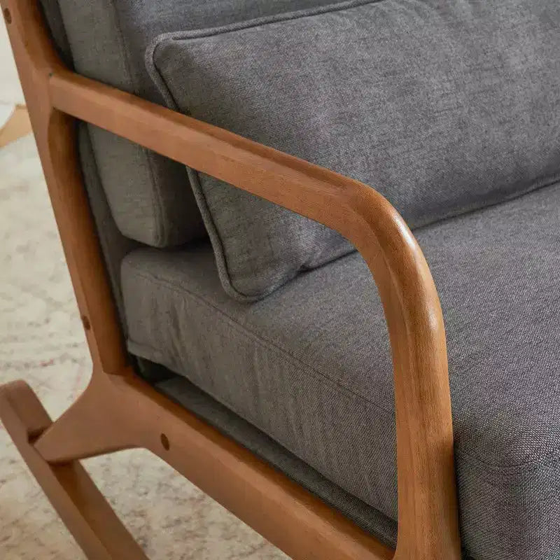 Fauteuil à bascule gris rembourré